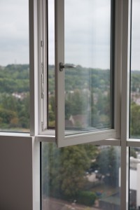 Aluminium curtain wall with integrated timber window